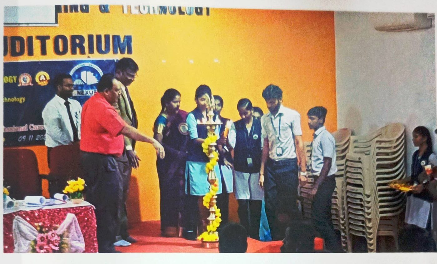 Lighting the lamp by the dignitaries of the day